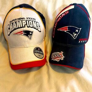 Two Patriots Superbowl hats. XXXVIII and XXXVI